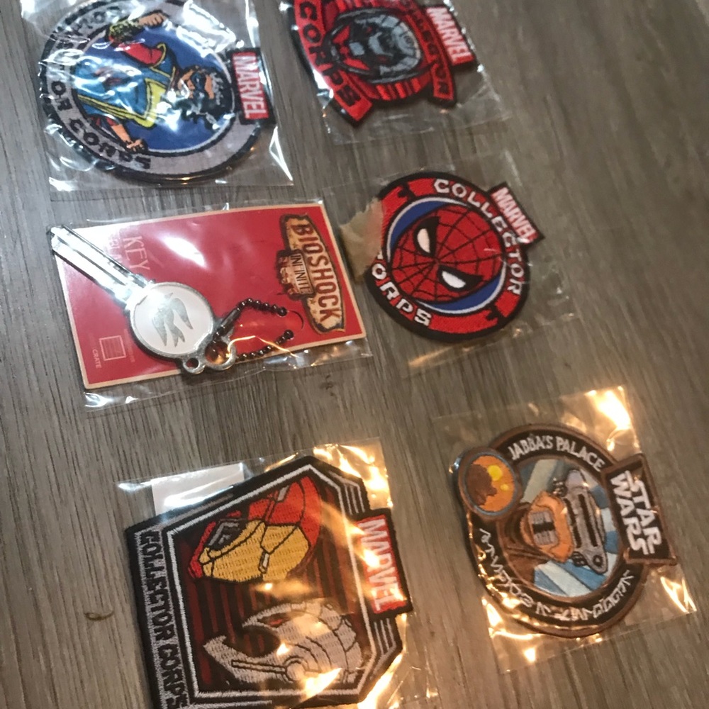 5 Marvel Collectors Corp patches & 1 bioshock key